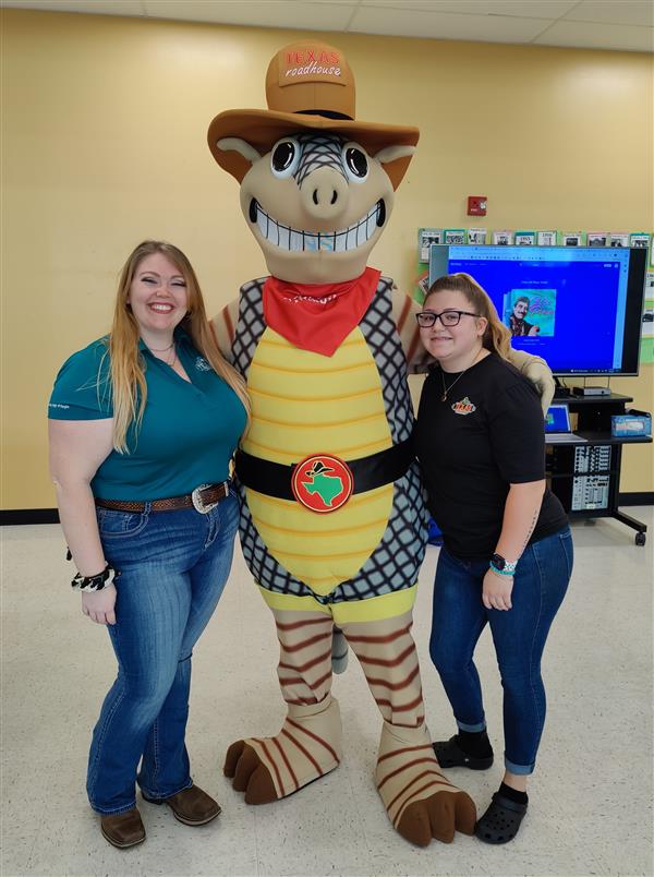 adults with andy the armadillo